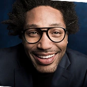 Smiling adult male patient after treatment